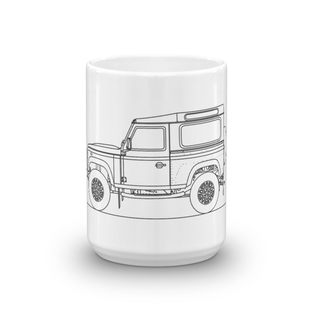Land Rover Defender mug on a table.